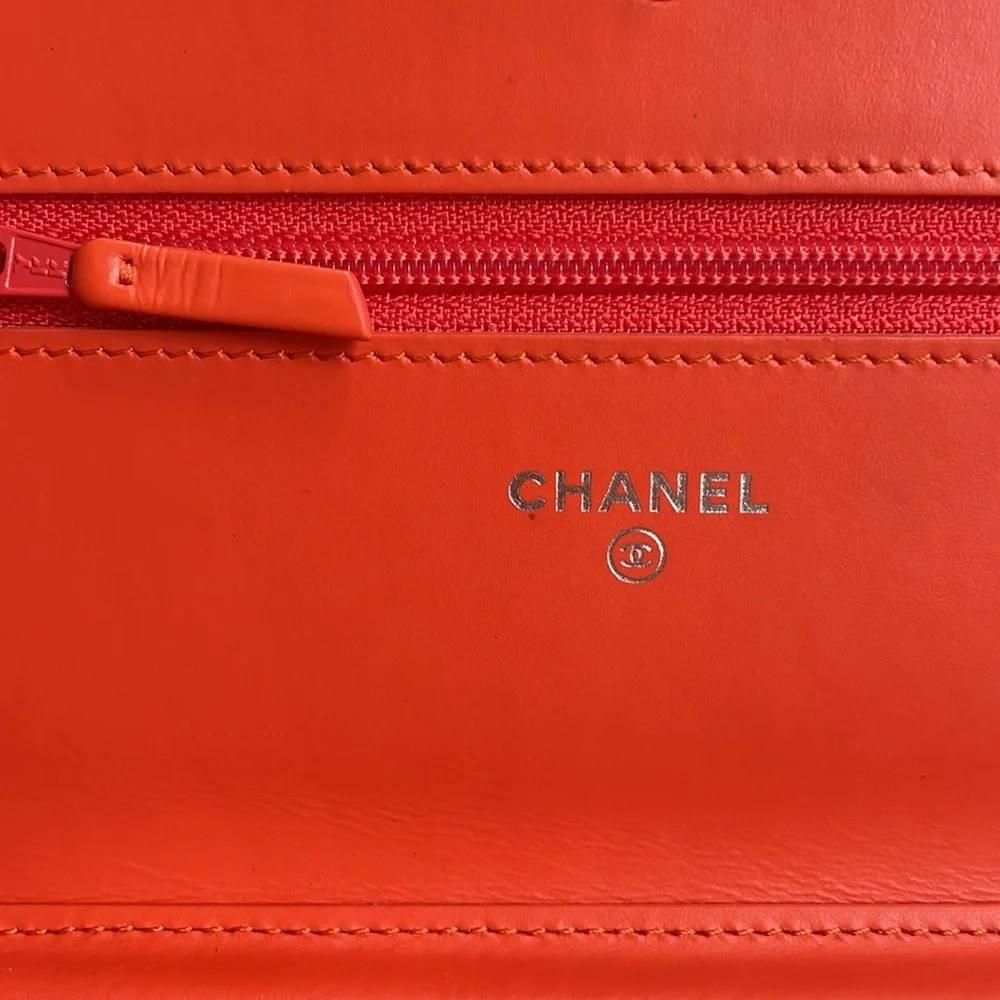 CHANEL Orange Quilted Patent Leather Crossbody Bag